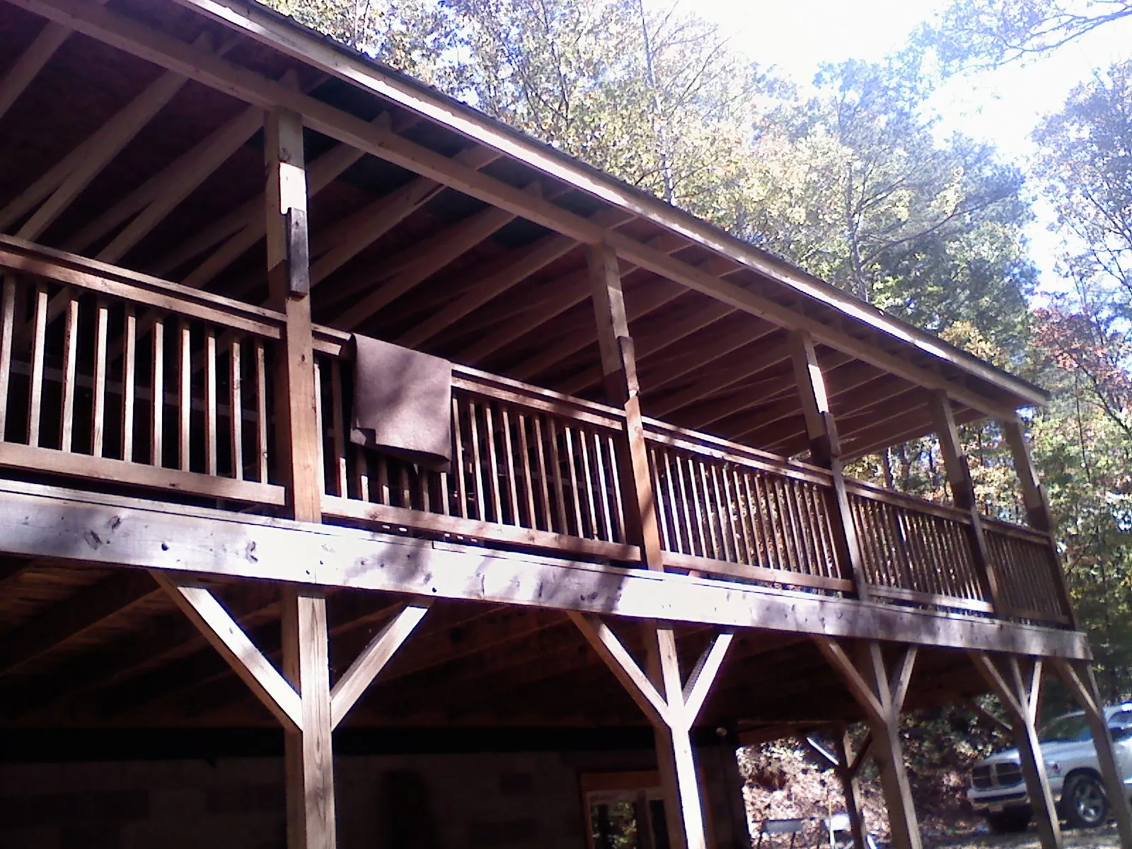 Timber framing under a new elevated porch and deck — Roof Leak Repair in Rollinsford by Roofing Brothers
